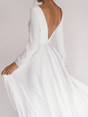 White one-neck long-sleeve halter dress