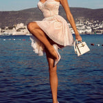 Short Dress With Suspenders And Bright Diamonds