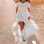 White Sling Ruffled Ball Gown